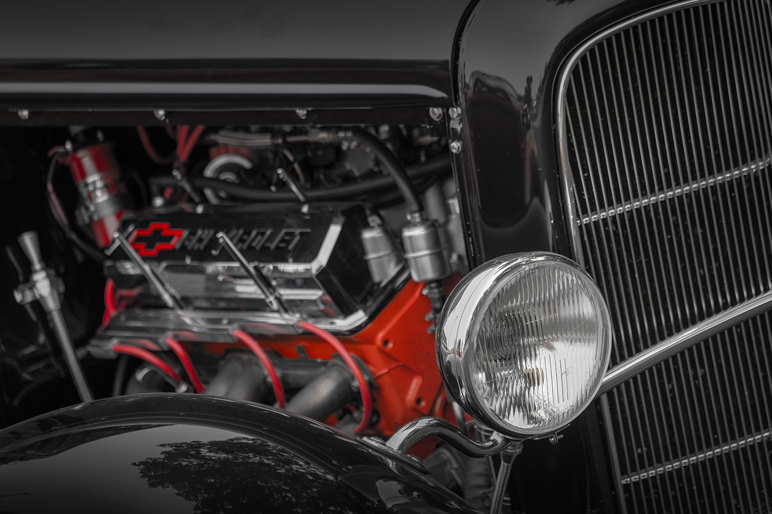 Chevy Engine and Chrome Headlight