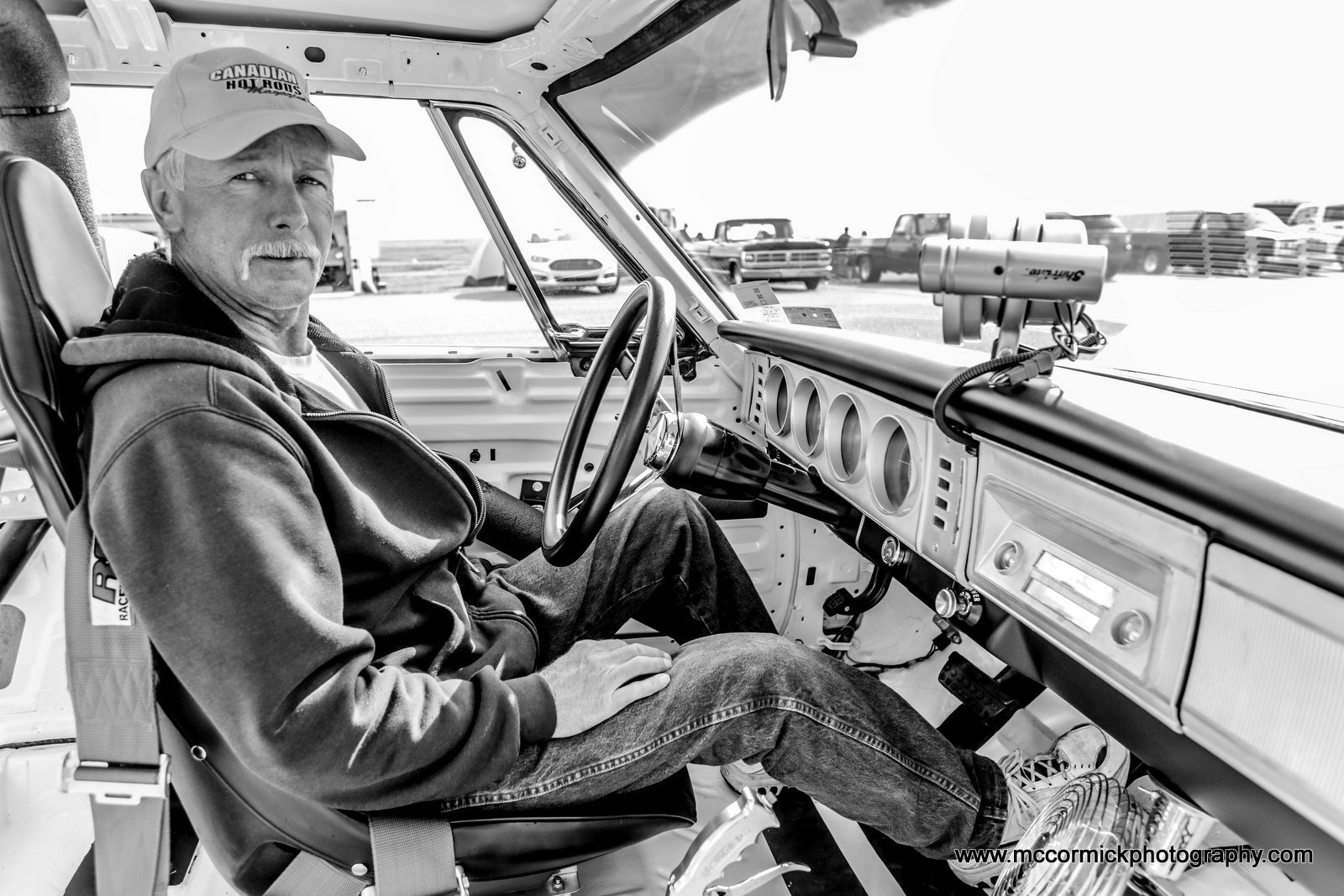 Driver in Classic Car Cockpit