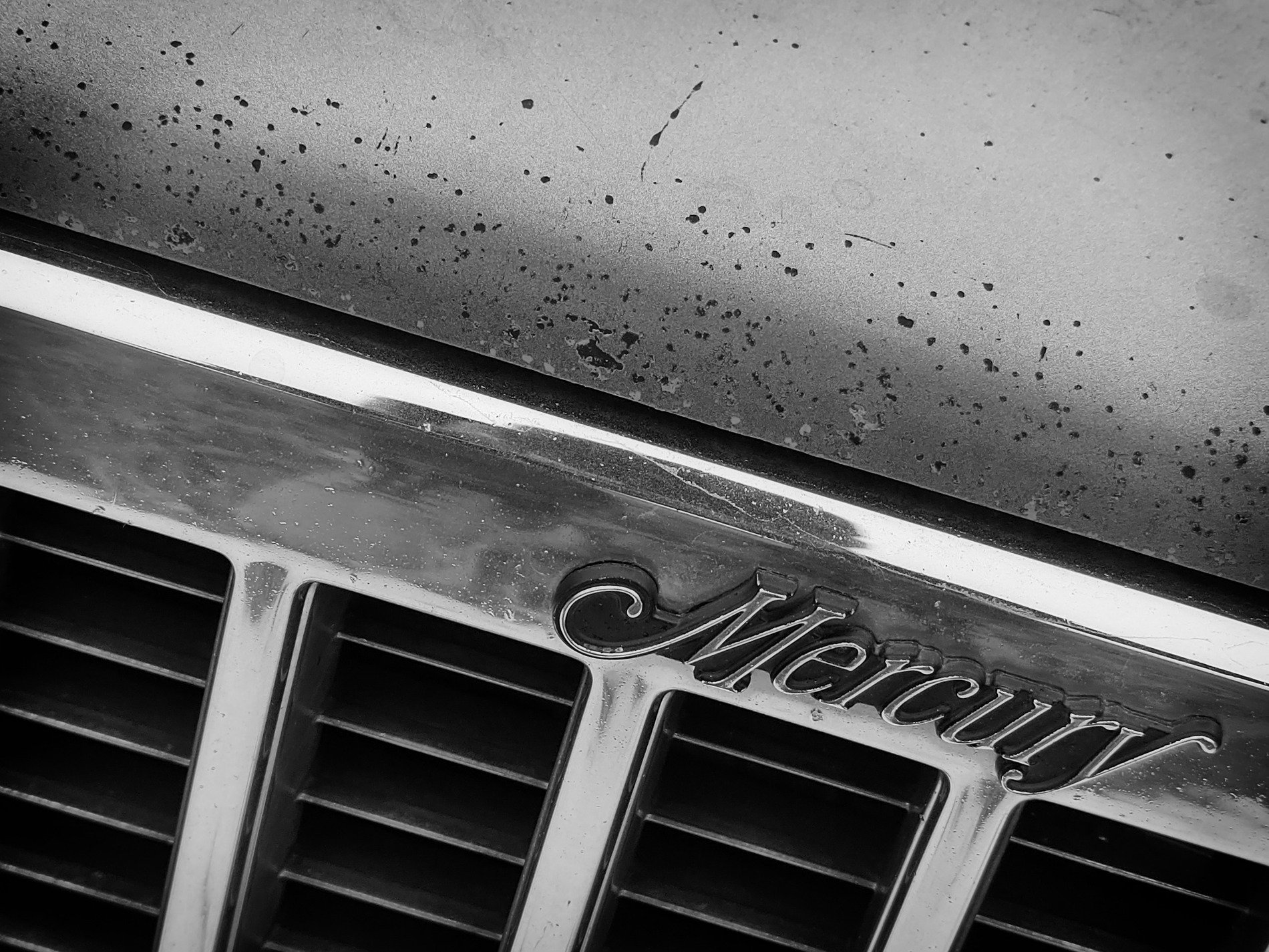Mercury Emblem and Grille