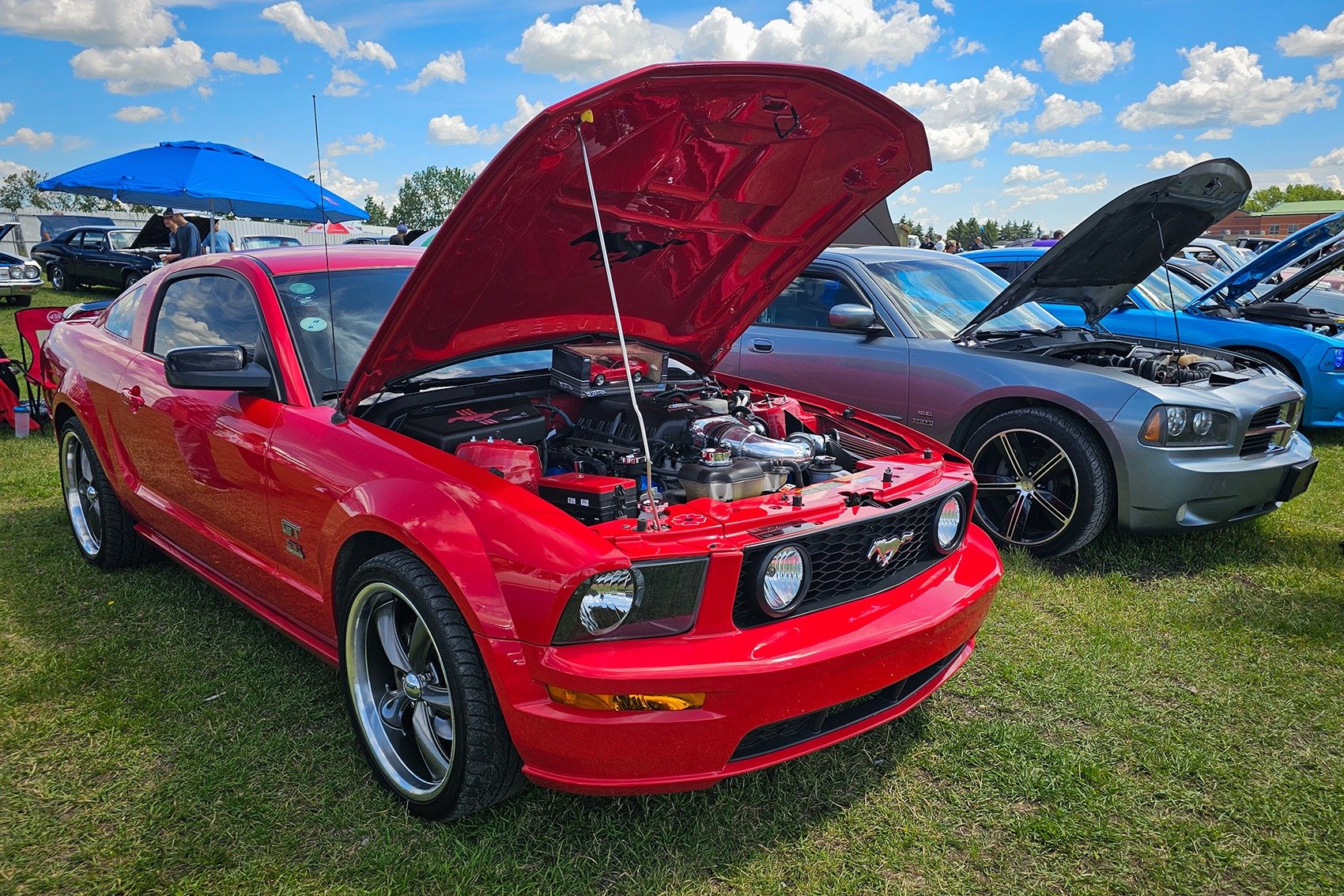 Red Mustang GT at a Car Show