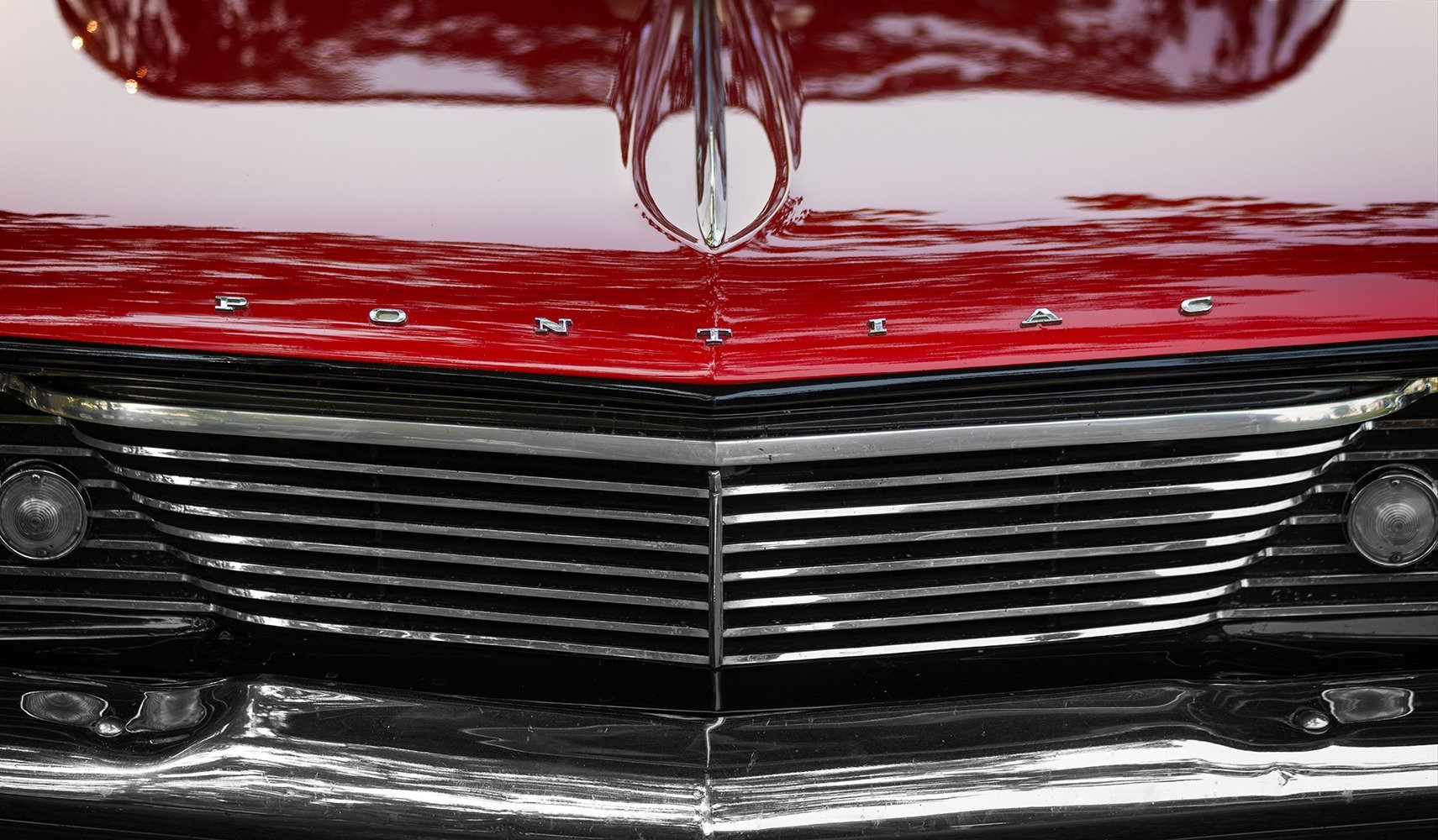 Red Pontiac Grille