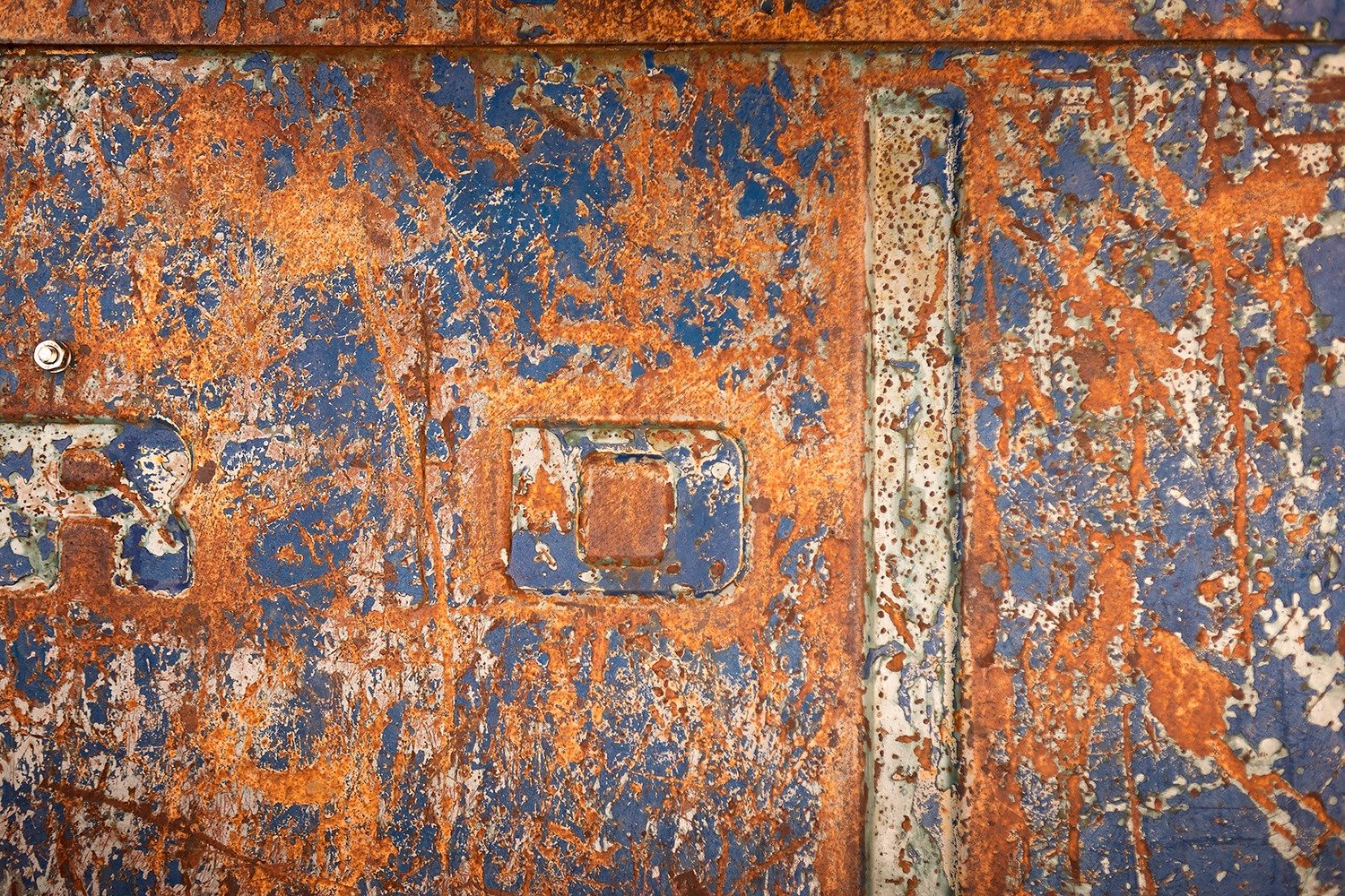 Rusted Blue Ford Lettering
