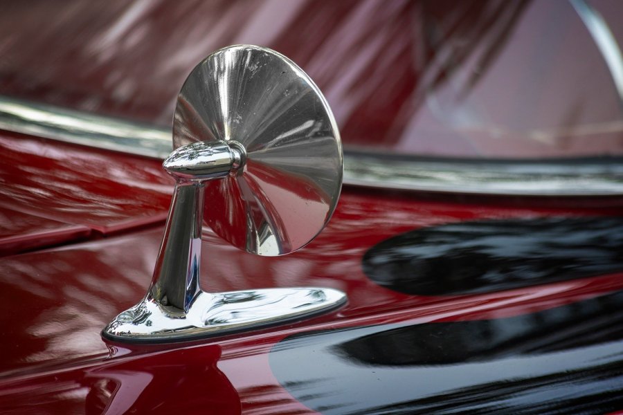 Chrome Fender Mirror on Red Car