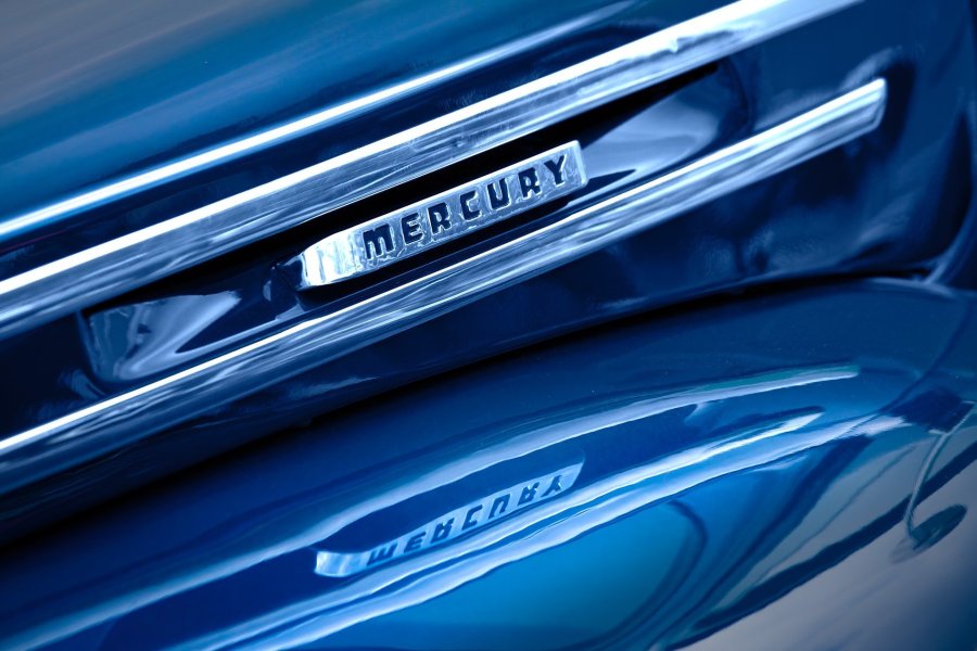 Mercury Badge and Reflection