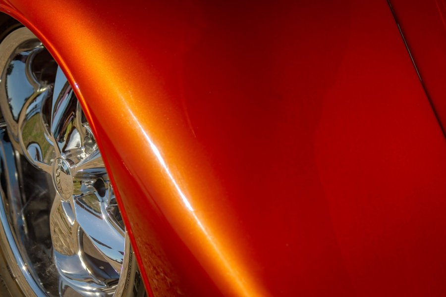 Metallic Orange Fender and Chrome Wheel
