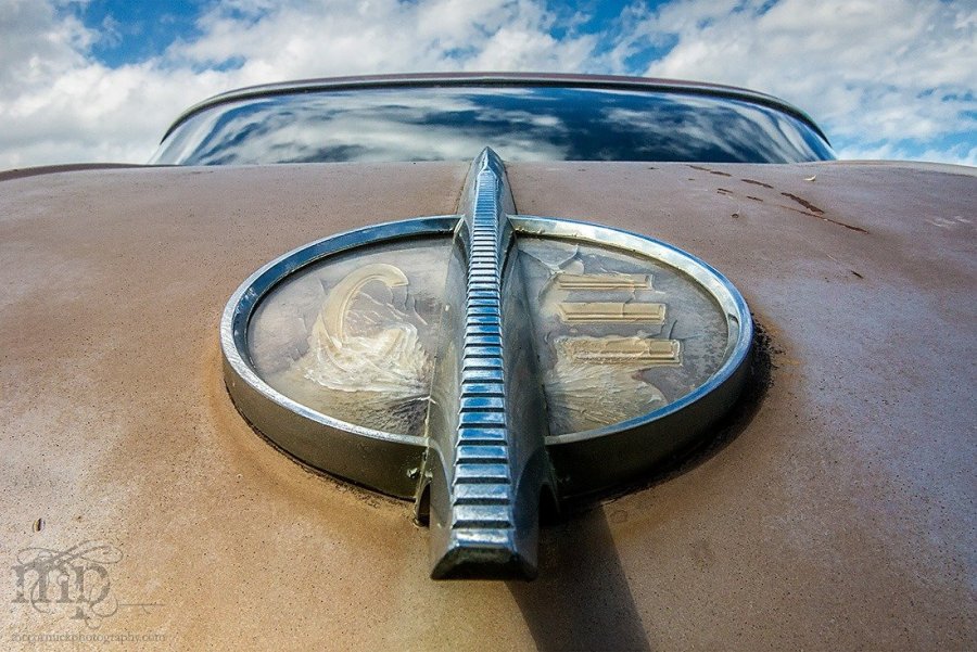 Weathered Packard Emblem