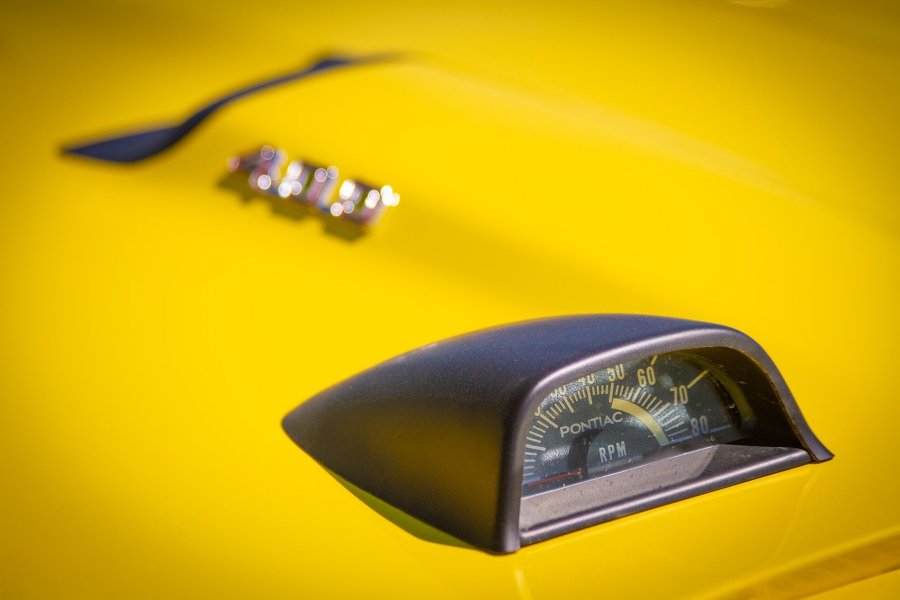 Yellow Pontiac Hood Tachometer